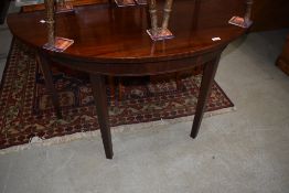 A 19th Century mahogany demi lune side table , possibly a D end originally