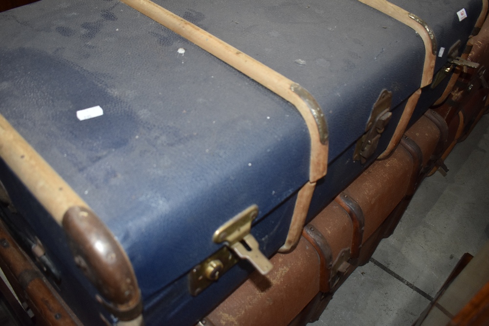 Two vintage luggage trunks