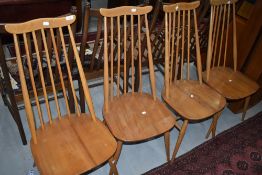 A set of four Ercol wave and stick high back kitchen dining chairs