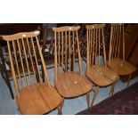 A set of four Ercol wave and stick high back kitchen dining chairs