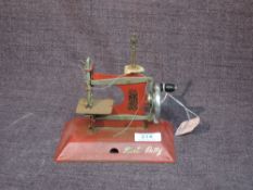 A tin plate Little Betty Child's Sewing Machine