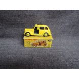 A Dinky diecast, 254 Austin Taxi, Yellow, in original box, missing end flaps