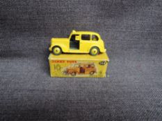 A Dinky diecast, 254 Austin Taxi, Yellow, in original box, missing end flaps