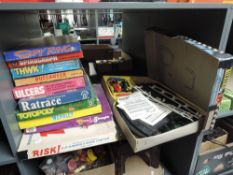 A shelf of vintage Games including Risk, Totopoly, Ratrace, Ulcers, Think etc along with a