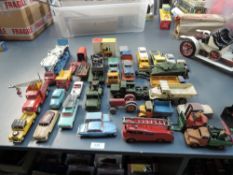 A collection of playworn diecasts including Dinky and Corgi including Military, Foden Wagons, 404