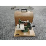 A Grain Child's Sewing Machine in wooden carry case