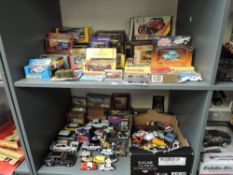 Two shelves of modern diecasts including Matchbox Models of Yesteryear, Anson 1:18 diecast Lotus