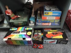 A shelf of mixed Toys & Games including Radotin Tele-Sport III along with 1003 Skill Cycle