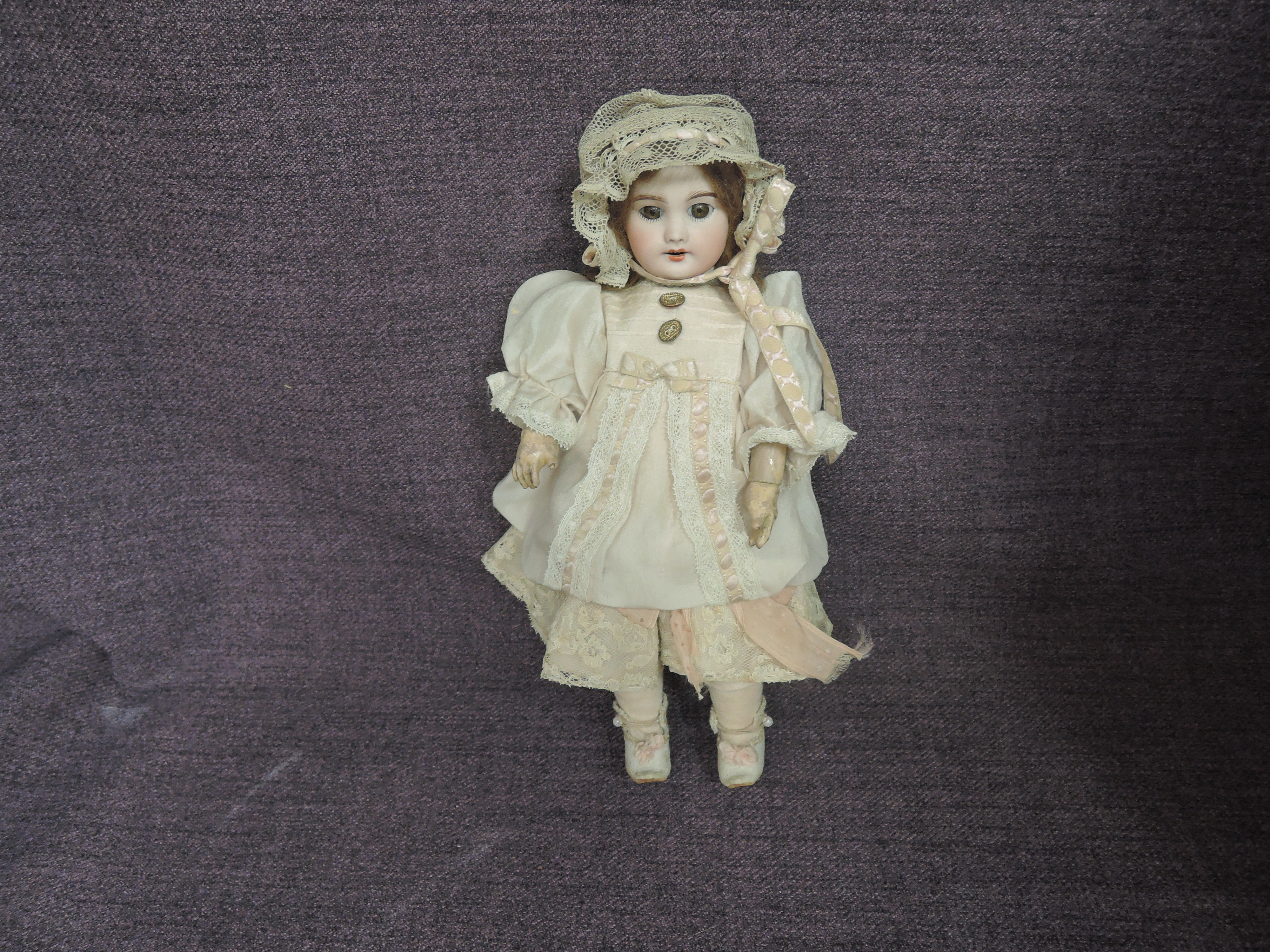 A early 20th century SFBJ bisque headed doll having fixed open eyes, open mouth with four teeth - Image 2 of 4
