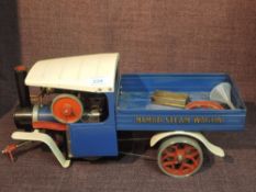 A Mamod Live Steam Wagon in blue with white cab (af)