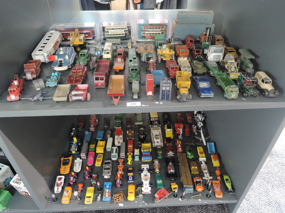 Two shelves of mixed vintage mainly playworn diecasts including Dinky, Corgi, Matchbox erc, approx
