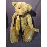 A Brown Bears Mohair Jointed Teddy Bear, golden yellow having plastic eyes, stitched nose and mouth,