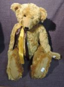 A Brown Bears Mohair Jointed Teddy Bear, golden yellow having plastic eyes, stitched nose and mouth,