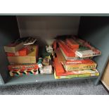 A shelf of vintage Games and Toys including Pendium of Games, Philips EE1003, Magic Robot,