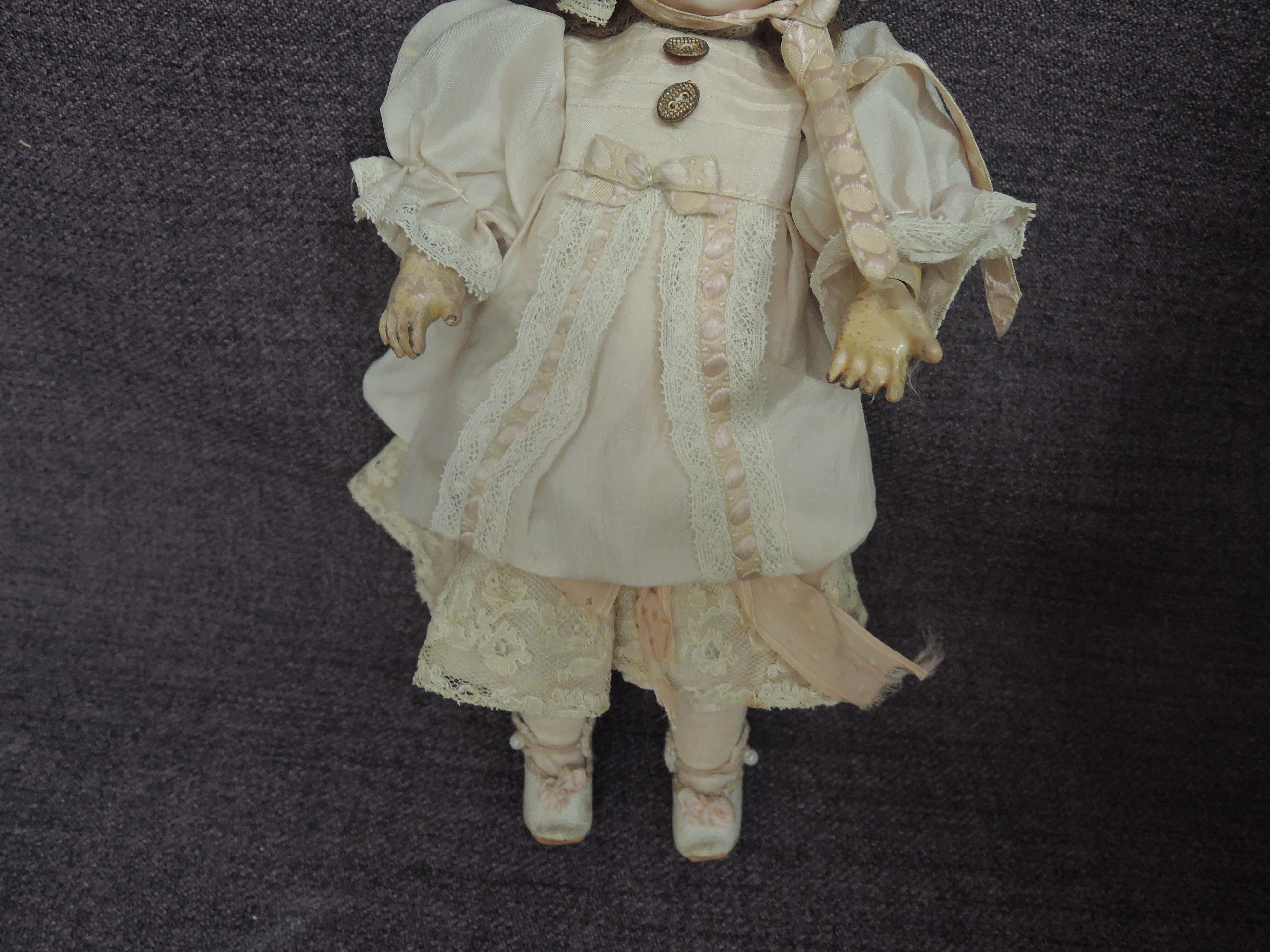A early 20th century SFBJ bisque headed doll having fixed open eyes, open mouth with four teeth - Image 3 of 4