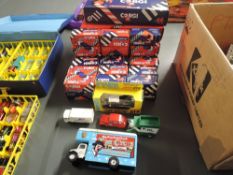A collection of 37 1980's Corgi diecasts, all in original blue or red boxes along with 5 later