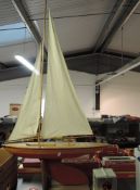 A Bowman wooden model Racing Yacht, height 150cm approx, length 70cm approx, on wooden stand