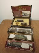 A Hornby 00 gauge Ex-Caledonian LMS 4-2-2 Loco & Tender 14010 in display box R763 along with two