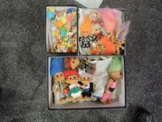 Three boxes containing Sixty Six mixed size Troll Dolls including Russ, TT etc