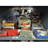 A shelf of Corgi diecasts, 1980's onwards, mainly boxed, part boxed, approx 30
