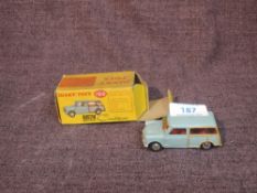 A Dinky diecast, 199 Austin Se7en Countryman in blue with brown woodwork and red interior, in