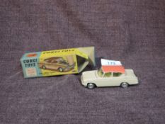 A Corgi diecast, 234 Ford Consul Classic in fawn with salmon pink roof and yellow interior, in