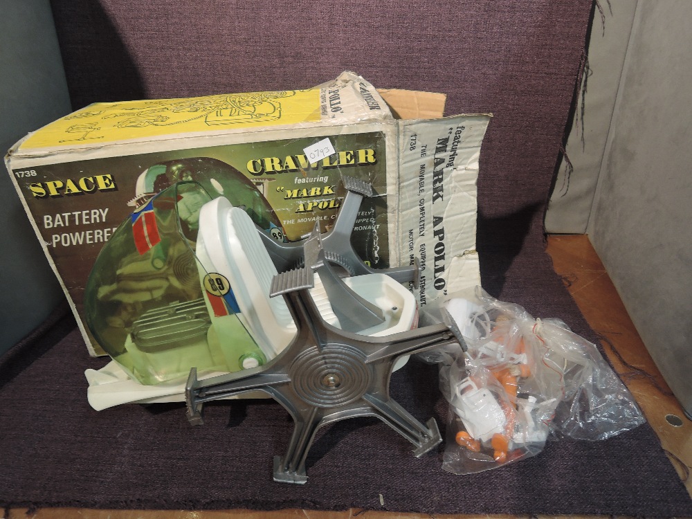 A Marx battery operated plastic Space Crawler featuring Mark Apollo, in original box