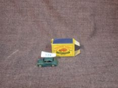 A Matchbox Lesney diecast, No 46 Morris Minor in dark green, in original box, one end flap loose but