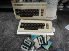 A 1980's Commodore VIC-20 Colour Computer in original box with power leads and accessories