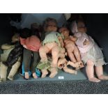 A shelf of mid 20th century and later Dolls including Palitoy and similar, composition, celluloid