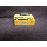 A Dinky diecast, 174 Hudson Hornet Sedan, Yellow & Grey in original correct spot box