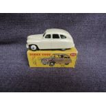 A Dinky diecast, 153 Standard Vanguard, Cream, in original correct spot box