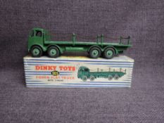 A Dinky diecasts, 905 Foden Flat Truck with Chains, Green, in original blue and white striped box