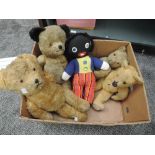 Four mid 20th century straw filled yellow plush Teddy Bears all having plastic eyes, stitched