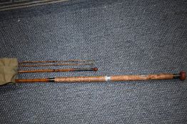 J Stephenson of Alnwick 3 pc 14 ft split cane rod with spare tip in canvas sleeve