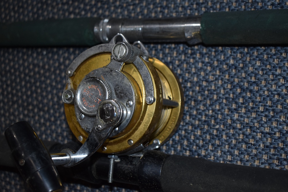 Two mitchell boat sea fishing rods one with a penn international 20 big game saltwater lever drag - Image 2 of 2