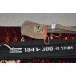 A shakespeare 1841-300 o series 3pc spinning rod and a milbro fibreglass spinning rod