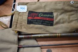 An Edgar Sealy 2pc Octopus split cane fly rod and another 2pc carbon fly rod both in soft sleeves