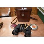 A Pair of Carl Zeiss Jena 10x50 jenoptem cased binoculars and two small hip flasks