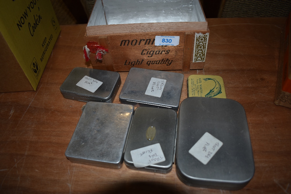 A selection of 6 small pocket tins containing trout flies one tin marked Hardy Bros ltd