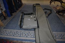 A Korum padded transportation bag and a Korum 5 rod quiver