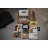 A mixed box of vintage fishing tackle including hooks reels line boxes and tins