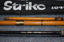 A Daiwa sensor carbon spin 3.05m, A Shakespeare strike 3.90m and a wooden boat rod