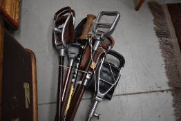 A collection of 5 Vintage shooting sticks