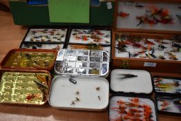 A large selection of salmon and trout flies in cases and boxes of which 2 are house of hardy boxes