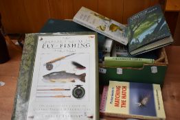 A small box of fishing and shooting related books