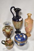 A selection of antique Royal Doulton wares including small jug, Ewer, Peach Glaze vase AF, lidded