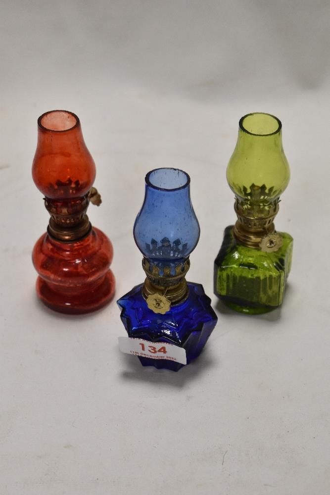 A selection of vintage miniature oil lamps and bud vases. - Image 2 of 2