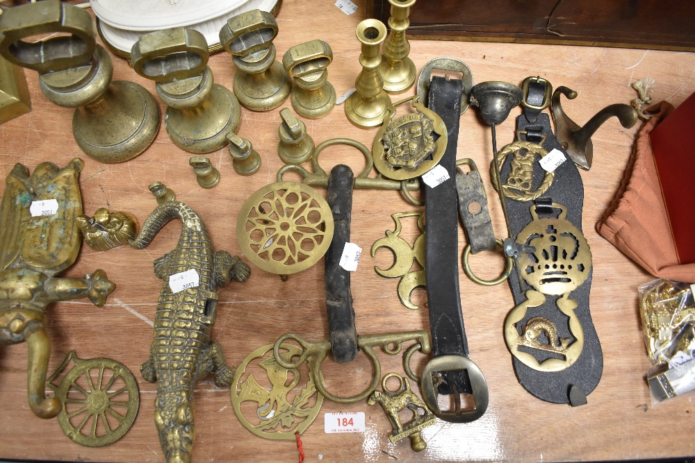 A large selection of brass wares, to include graduating bell weights, beetle boot jack, Martingales, - Image 3 of 3