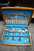 A Canteen of vintage stainless steel cutlery, including boned handled knives.